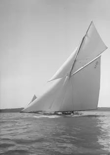 The 15 Metre cutter Ostara sailing close-hauled, 1911. Creator: Kirk & Sons of Cowes