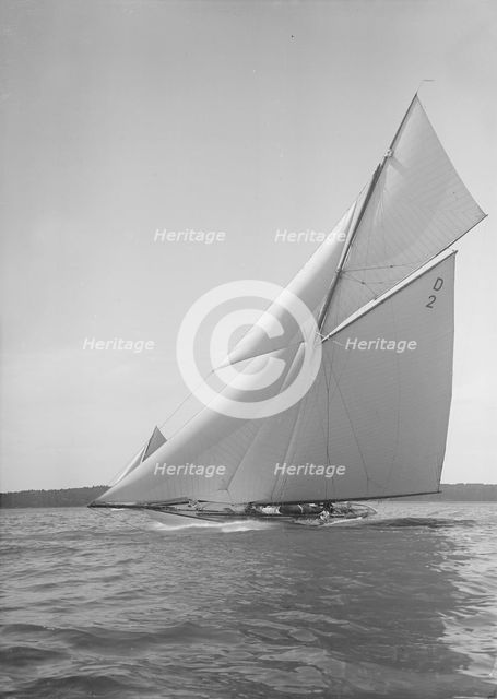 The 15 Metre cutter 'Ostara' sailing close-hauled, 1911. Creator: Kirk & Sons of Cowes.