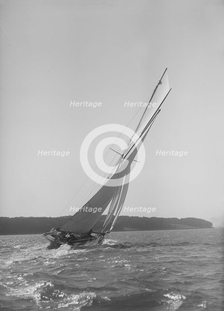The 15 Metre cutter 'Ostara' sailing close-hauled, 1911. Creator: Kirk & Sons of Cowes.