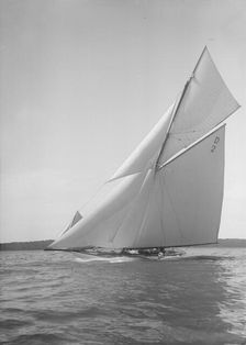 The 15 Metre cutter Ostara sailing close-hauled, 1911. Creator: Kirk & Sons of Cowes
