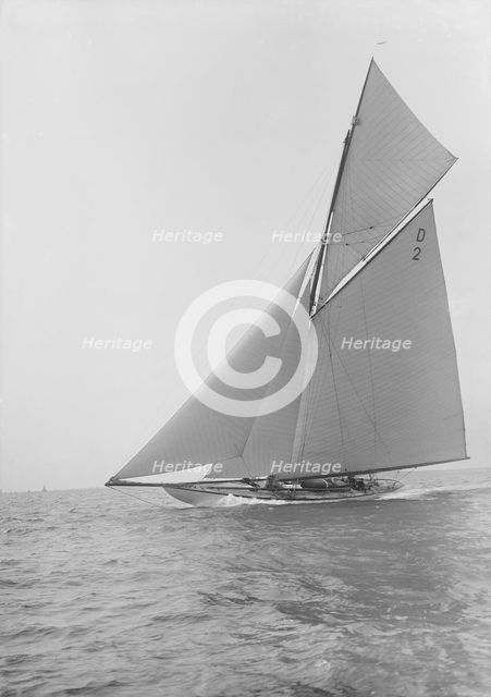 The 15-metre cutter 'Ostara' sailing close-hauled, 1912. Creator: Kirk & Sons of Cowes.