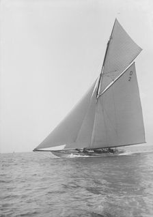 The 15-metre cutter Ostara sailing close-hauled, 1912. Creator: Kirk & Sons of Cowes