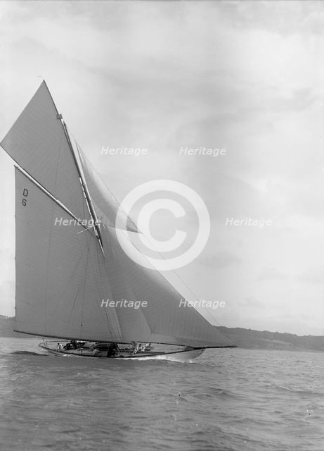 The 15 Metre cutter 'Sophie Elizabeth' sailing close-hauled, 1911.  Creator: Kirk & Sons of Cowes.