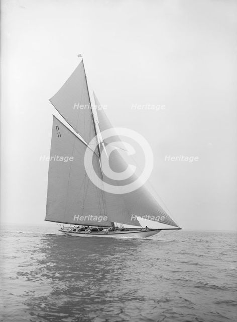 The 15-metre class 'Maudrey' sailing close-hauled, 1913. Creator: Kirk & Sons of Cowes.