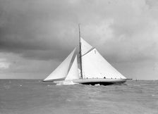 The 15 Metre class sailing yacht Istria close-hauled and heeling in fresh breeze, 1912. Creator: Kirk & Sons of Cowes
