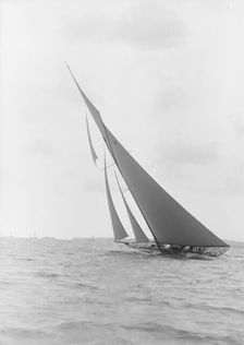 The 15 Metre class sailing yacht Paula III heeling on windward leg, 1913. Creator: Kirk & Sons of Cowes