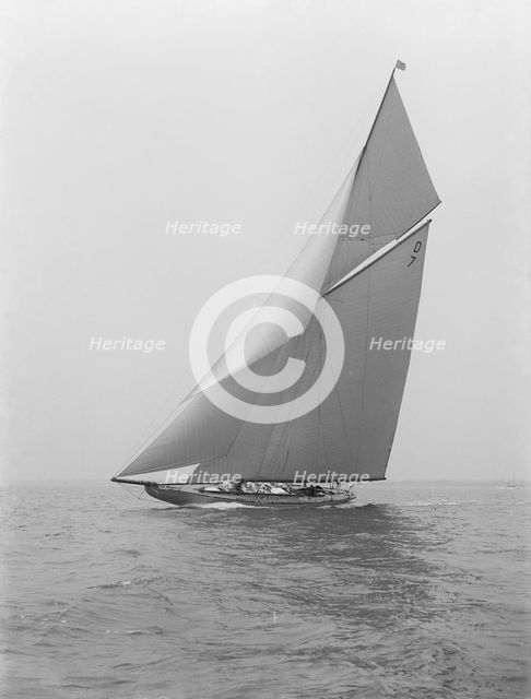The 15 Metre 'Istria' sailing close-hauled, 1914.  Creator: Kirk & Sons of Cowes.