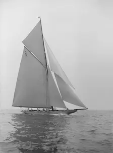 The 15 Metre Istria sailing close-hauled, 1913. Creator: Kirk & Sons of Cowes
