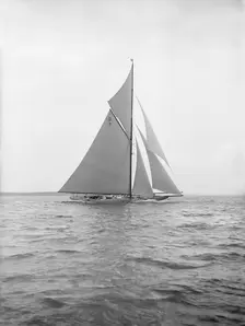The 15 Metre Istria sailing close-hauled, 1913. Creator: Kirk & Sons of Cowes