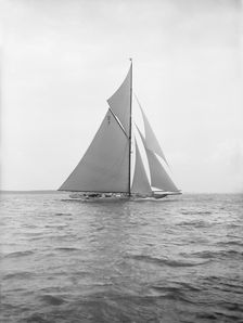 The 15 Metre Istria sailing close-hauled, 1913. Creator: Kirk & Sons of Cowes