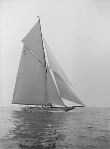 The 15 Metre Istria sailing close-hauled, 1913. Creator: Kirk & Sons of Cowes