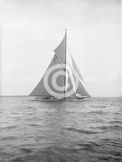 The 15 Metre 'Istria' sailing close-hauled, 1913. Creator: Kirk & Sons of Cowes.