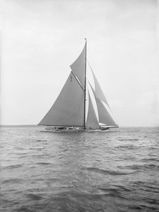 The 15 Metre Istria sailing close-hauled, 1913. Creator: Kirk & Sons of Cowes