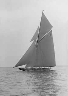 The 15 Metre Istria sailing close-hauled, 1913. Creator: Kirk & Sons of Cowes