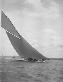 The 15 Metre sailing yacht Jeano making good headway, 1911. Creator: Kirk & Sons of Cowes