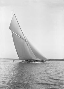 The 15 Metre sailing yacht Paula III in fine form, 1913. Creator: Kirk & Sons of Cowes