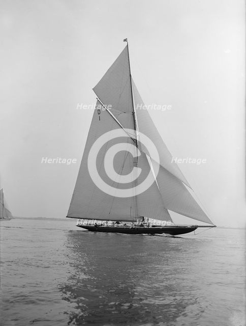 The 15 Metre sailing yacht 'Pamela' sailing close-hauled, 1913. Creator: Kirk & Sons of Cowes.