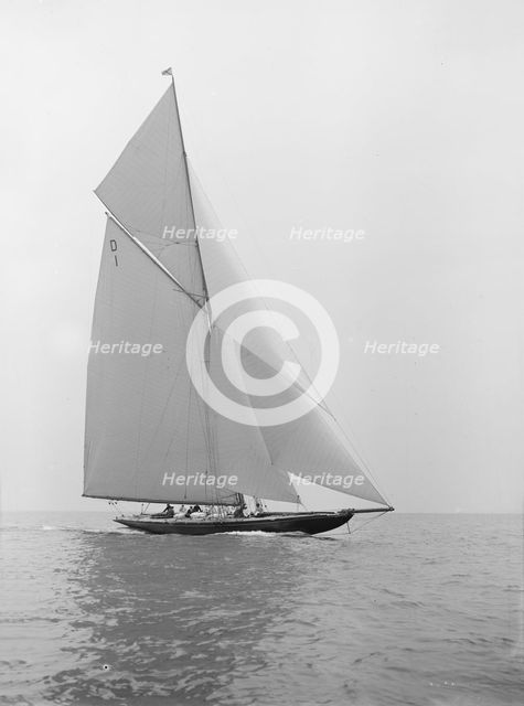 The 15 Metre sailing yacht 'Pamela' sailing close-hauled, 1913. Creator: Kirk & Sons of Cowes.