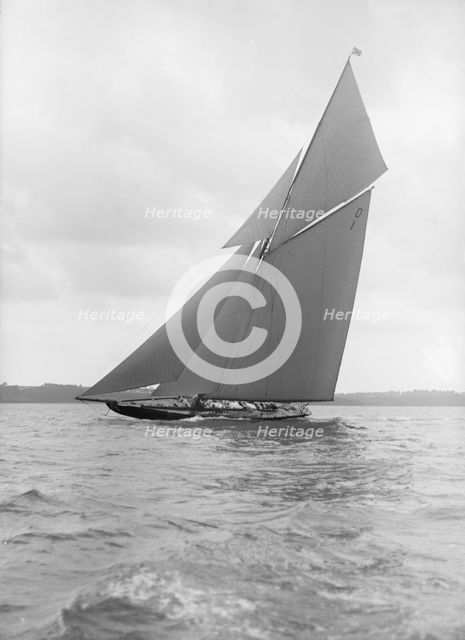The 15 Metre sailing yacht 'Pamela' sailing close-hauled, 1913. Creator: Kirk & Sons of Cowes.