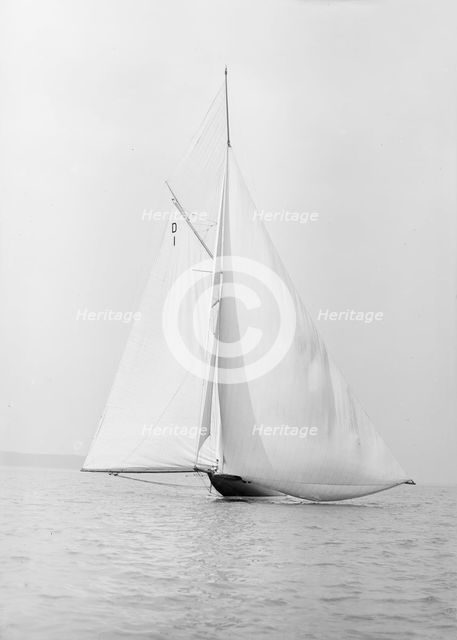 The 15 Metre sailing yacht 'Pamela' searching for wind, 1913. Creator: Kirk & Sons of Cowes.