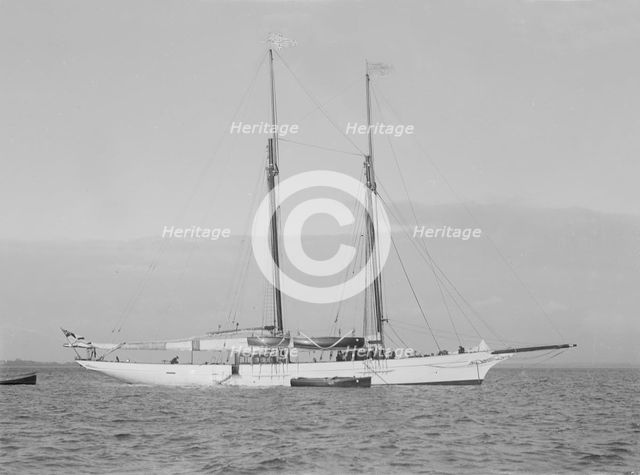 The 161 ton schooner 'Amphitrite' at anchor, 1922. Creator: Kirk & Sons of Cowes.