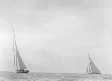 The 179 ton White Heather and 221 ton Britannia racing upwind, 1921. Creator: Kirk & Sons of Cowes