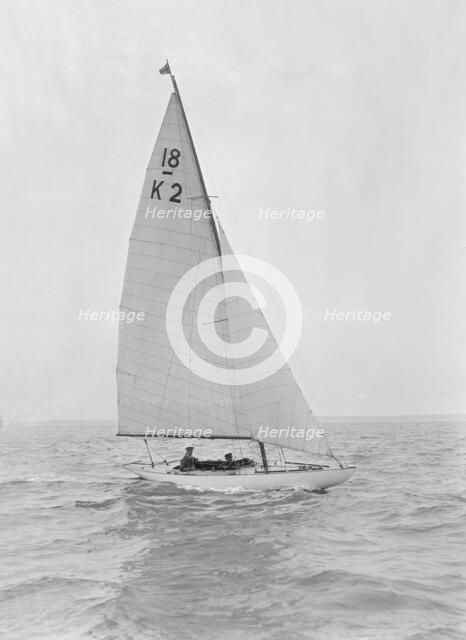 The 18-foot keelboat 'Prudence' (K2) under sail, 1922. Creator: Kirk & Sons of Cowes.