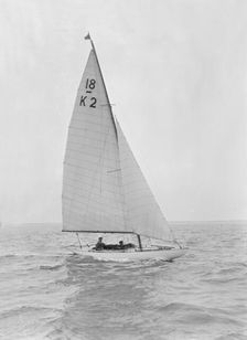 The 18-foot keelboat Prudence (K2) under sail, 1922. Creator: Kirk & Sons of Cowes