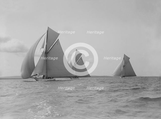 The 19-metre 'Maraquita', 'Corona' & 'Octavia' racing downwind, 1912. Creator: Kirk & Sons of Cowes.