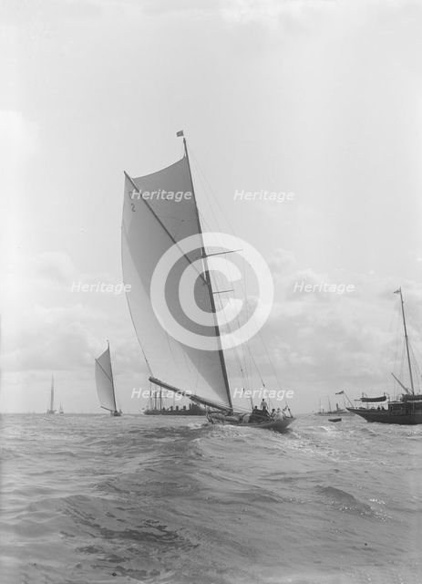 The 19-metre 'Octavia' sailing on a broad reach, 1911. Creator: Kirk & Sons of Cowes.