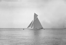 The 19-metre cutter Norada sailing in gentle winds, 1911. Creator: Kirk & Sons of Cowes