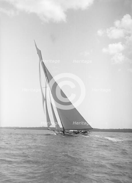 The 19-metre cutter 'Norada' sails close-hauled, 1911. Creator: Kirk & Sons of Cowes.