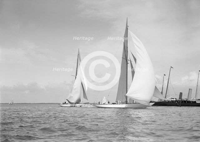 The 19-metre class 'Mariquita' (C1) & 'Corona' (C3) running with spinnakers up, 1911. Creator: Kirk & Sons of Cowes.