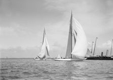 The 19-metre class Mariquita (C1) & Corona (C3) running with spinnakers up, 1911. Creator: Kirk & Sons of Cowes