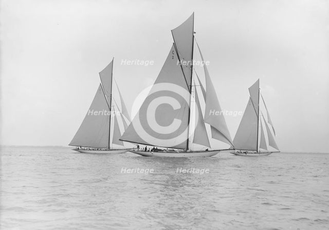 The 19-metre class 'Norada', 'Wendula' & 'Mariquita' racing close-hauled, 1911. Creator: Kirk & Sons of Cowes.