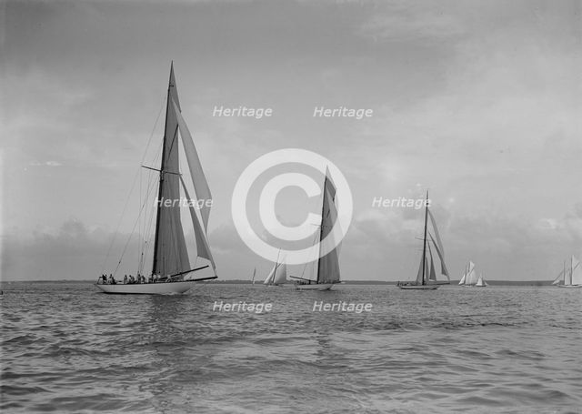 The 19-metres class 'Mariquita'  'Corona' & 'Octavia',  racing at Cowes, 1911. Creator: Kirk & Sons of Cowes.