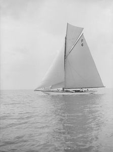 The 10 Metre class Eleda (F6) sailing close-hauled, 1913. Creator: Kirk & Sons of Cowes