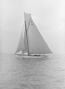 The 10 Metre class Eleda (F6) sailing close-hauled, 1913. Creator: Kirk & Sons of Cowes