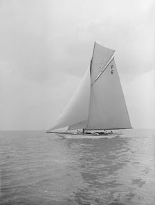 The 10 Metre class Eleda (F6) sailing close-hauled, 1913. Creator: Kirk & Sons of Cowes
