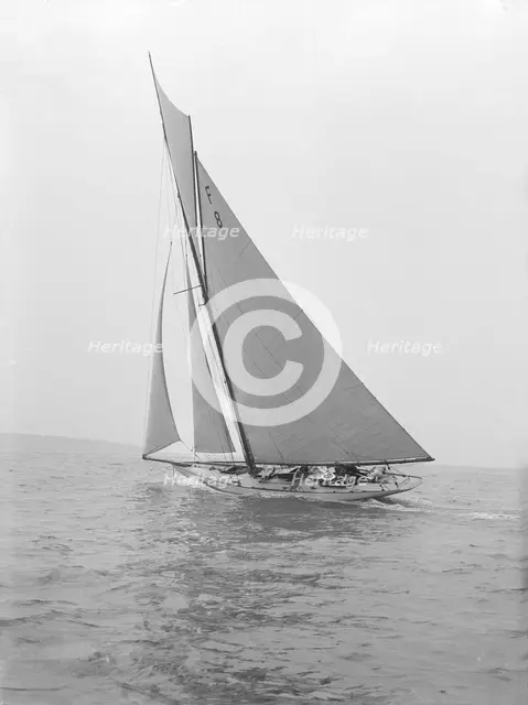 The 10 Metre class 'Pampero' (F8) sailing close-hauled, 1914. Creator: Kirk & Sons of Cowes.