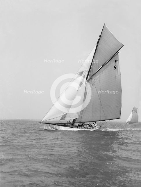 The 10 Metre class 'Pampero' (F8) sailing close-hauled, 1914. Creator: Kirk & Sons of Cowes.