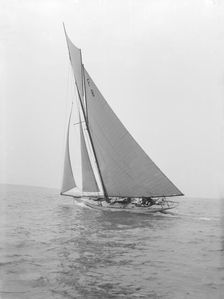 The 10 Metre class Pampero (F8) sailing close-hauled, 1914. Creator: Kirk & Sons of Cowes