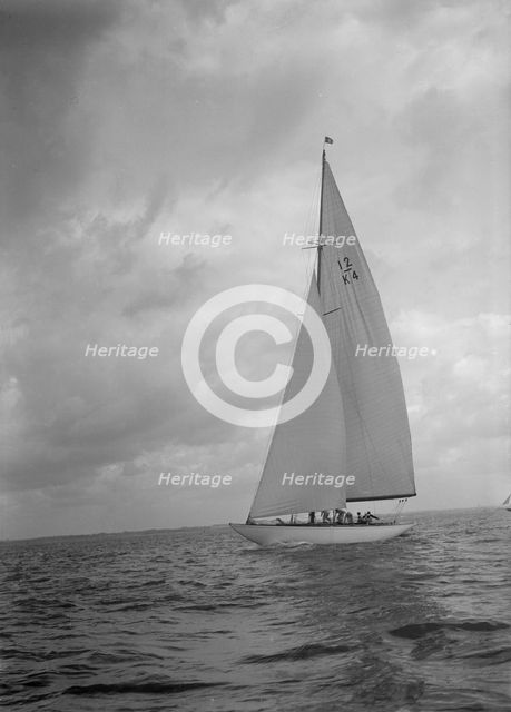 The 12 Metre bermuda rig sailing yacht 'Westra', 1936. Creator: Kirk & Sons of Cowes.