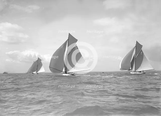 The 12 Metre class 'Alachie', 'Cintra' and 'Ierne' racing at Cowes, 1911. Creator: Kirk & Sons of Cowes.