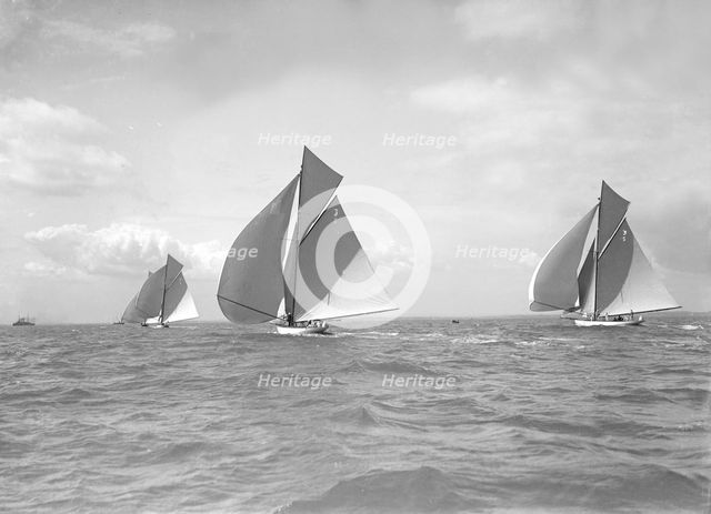 The 12 Metre class 'Alachie', 'Cintra' and 'Ierne' racing at Cowes, 1911. Creator: Kirk & Sons of Cowes.