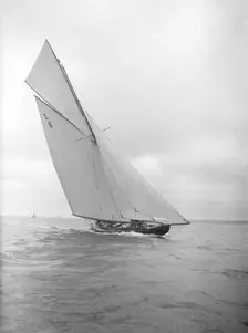 The 12 Metre sailing yacht Rollo racing upwind, 1911. Creator: Kirk & Sons of Cowes