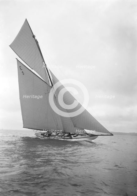 The 12 Metre yacht 'Javotte' sailng close-hauled, 1911. Creator: Kirk & Sons of Cowes.