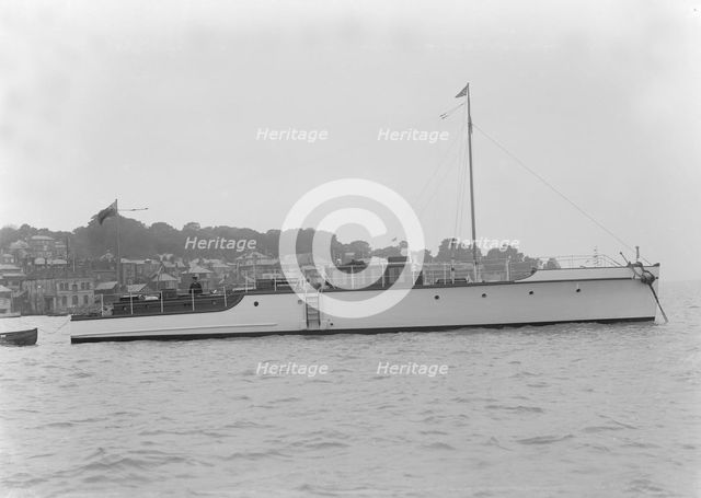 The 12 ton motor yacht 'Cordon Rouge' at anchor, 1923. Creator: Kirk & Sons of Cowes.