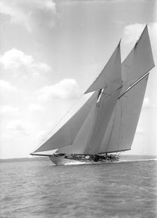 The 250 ton schooner Germania sails close-hauled, 1911. Creator: Kirk & Sons of Cowes