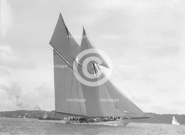The 250 ton schooner 'Germania' sails close-hauled, 1911. Creator: Kirk & Sons of Cowes.